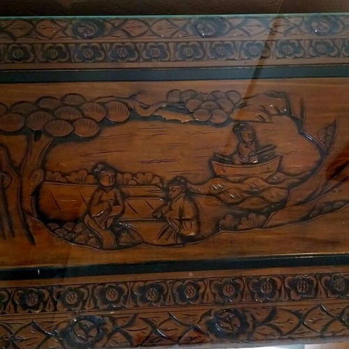 Carved chest used with thick glass