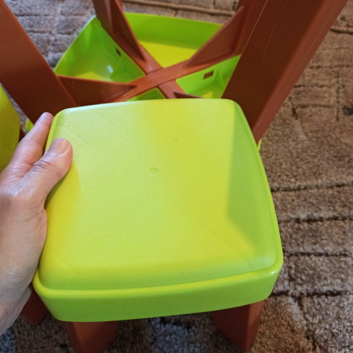 Plastic table set with 2 stools like new, green for toddlers