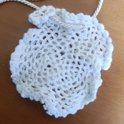 Small knitted pouch used, white