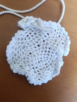 Small knitted pouch used, white