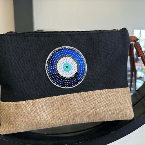 Black clutch bag with blue eye and leather strap new