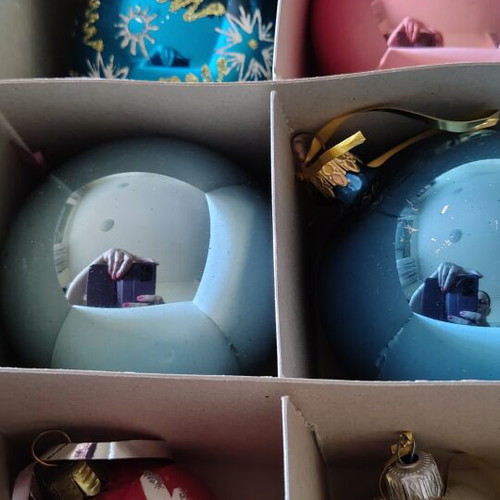Vintage Christmas ornaments in original packaging