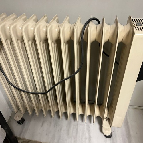 Oil radiator used, 2 pieces with 11 and 12 fins