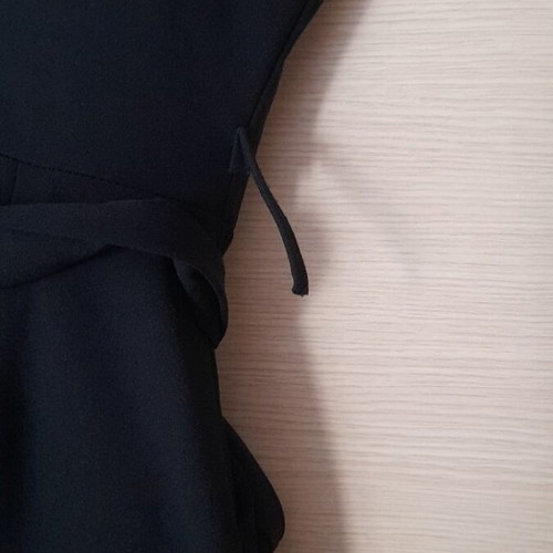 Black jumpsuit like new with zipper and belt, size M