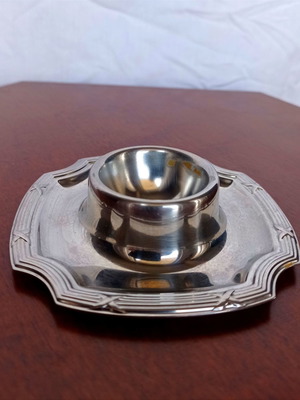Metal egg holder used, silver color