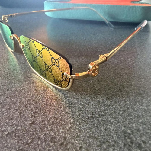 Gucci GG1278S 005 sunglasses, pink GG monogram, gold frame