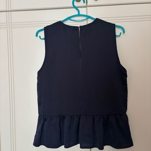 Molly Bracken sleeveless blouse like new, blue with ruffles