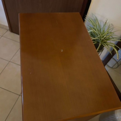 Furniture used with wheels and signs of wear