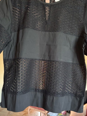 Women's blouse like new, short sleeve, black with hole design, size S