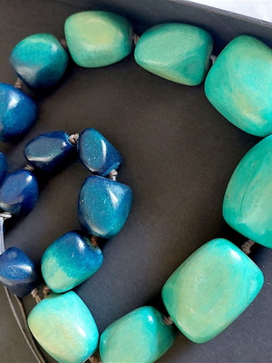 Handmade wooden boho necklace in blue and turquoise shades like new