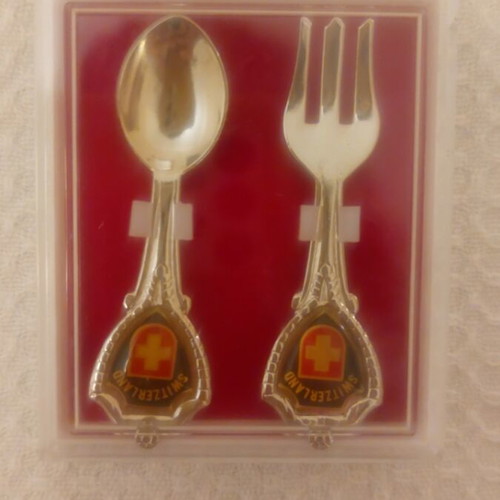 Collectible Switzerland spoon and fork set like new, in box