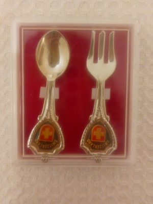 Collectible Switzerland spoon and fork set like new, in box