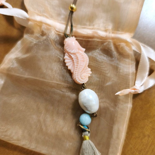 Summer long necklace with pastel seahorse used