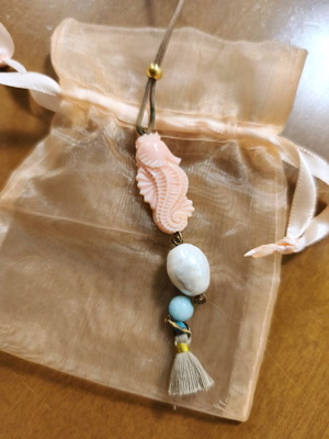Summer long necklace with pastel seahorse used