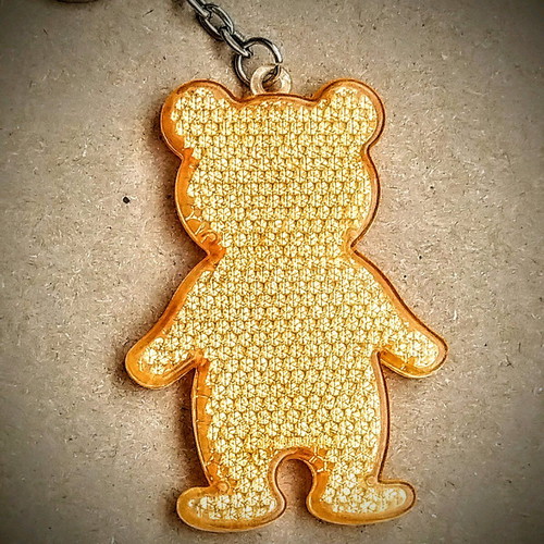 Reflective keychain Bear like new, yellow and orange