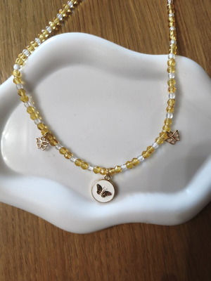 Handmade necklace with beads new, white and orange