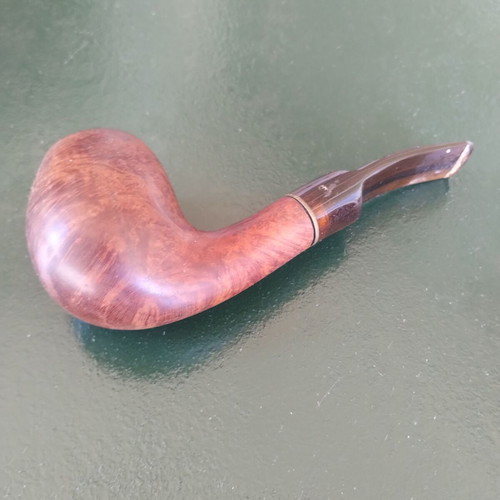 Pipe made of heather wood used with replacement mouthpiece