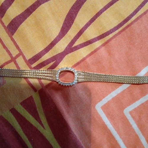 Luxury watch frame with crystals like new, gold plated