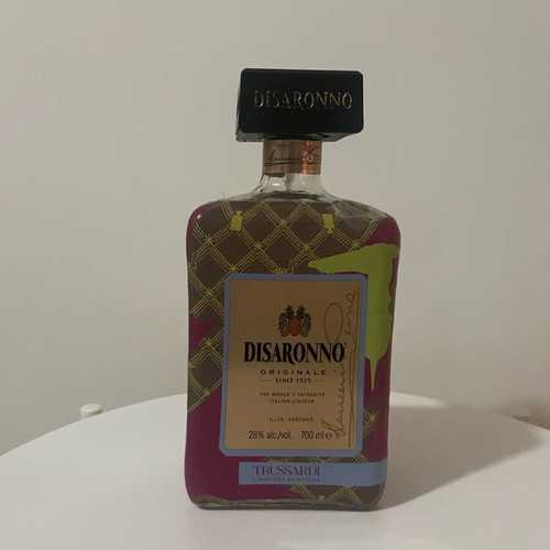 Disaronno collectible bottle used, Disaronno Wears Trussardi