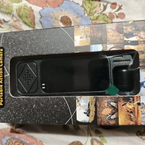 Mini camera new with instructions and charging cable