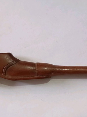 Vintage wooden smoking pipe used, shoe-shaped