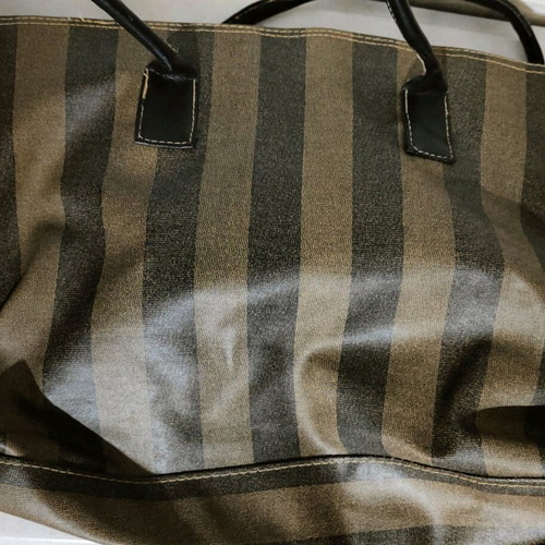 Handbag used with beige-brown stripes, plastic fabric
