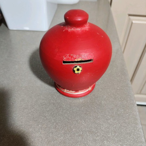 Clay piggy bank 25 years old