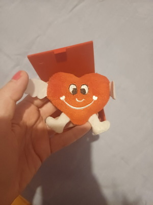 Surprise toy with plush heart