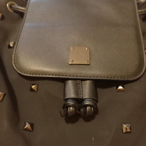 Crossbody bag new, black color, convertible to backpack