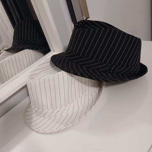 Hats like new, black and white, one size