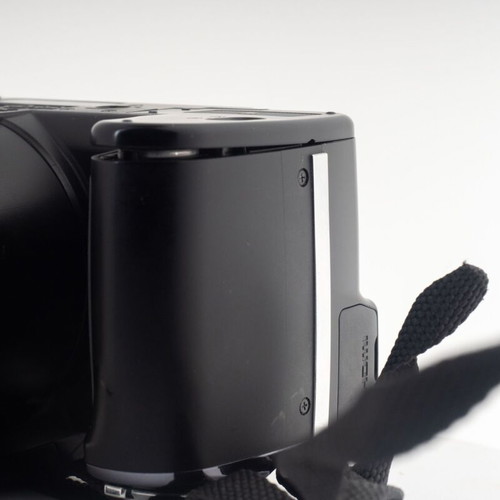 Olympus SP-620UZ Digital Bridge Camera used with slight battery door gap