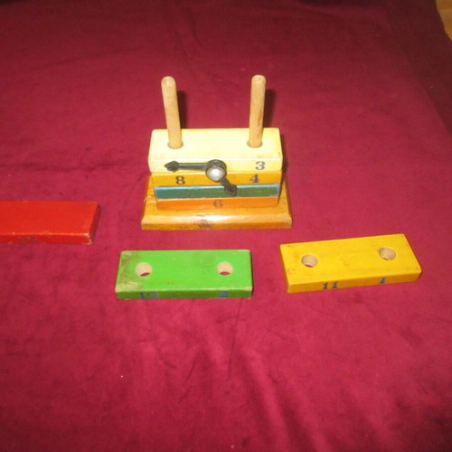 Wooden toy clock coil used 70s