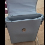 Small blue crossbody bag with chain and studs