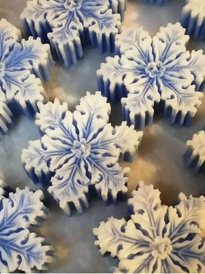 Snowflake candle new in various colors and scents