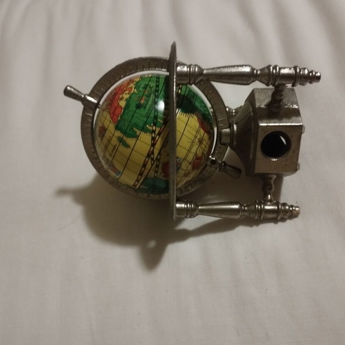 Globe pencil sharpener like new, metal decorative