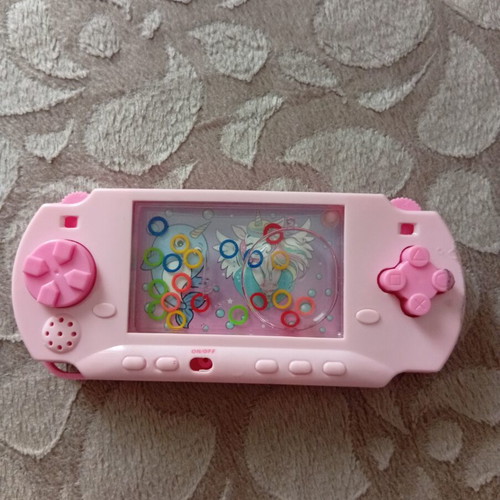 Ring toss water game used, missing one button
