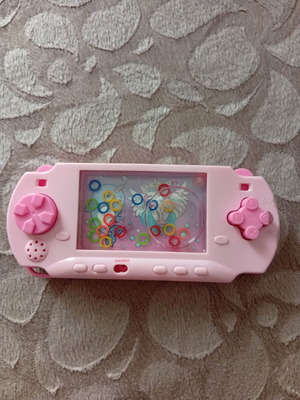 Ring toss water game used, missing one button