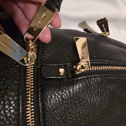 Michael Kors black backpack like new with gold details