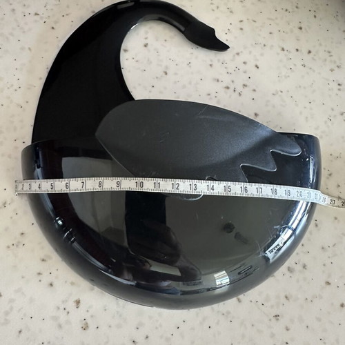 Bathroom accessory in black swan shape