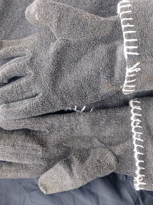 Fleece scarf and gloves set used, gray with white stitching