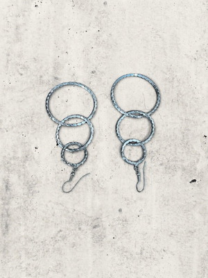 Minimal Geometric earrings used, silver layered design