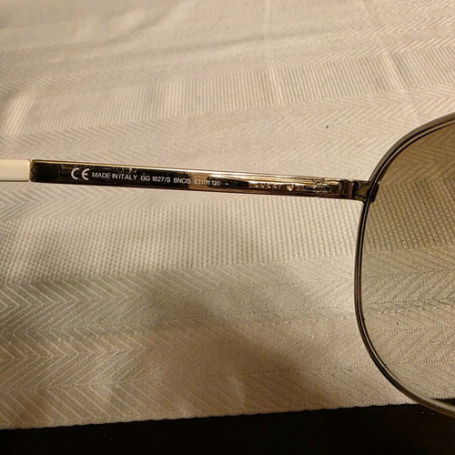 Gucci sunglasses used, white and gold