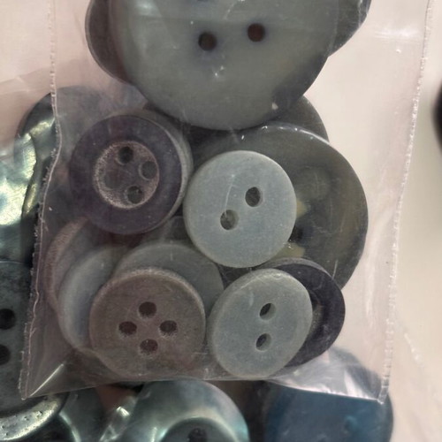 Various green and metal buttons like new