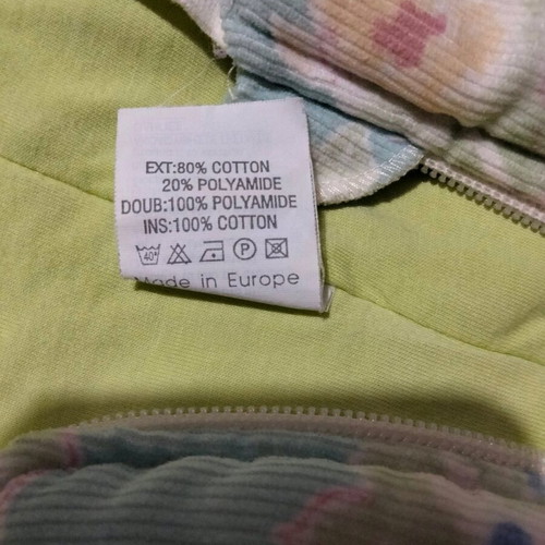 Baby sleeping bag or full-body romper with zipper and floral pattern like new
