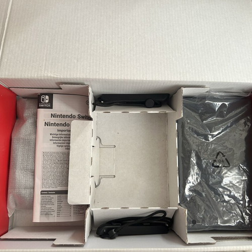 Nintendo Switch console with Joy-Con controllers and dock