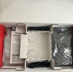 Nintendo Switch console with Joy-Con controllers and dock