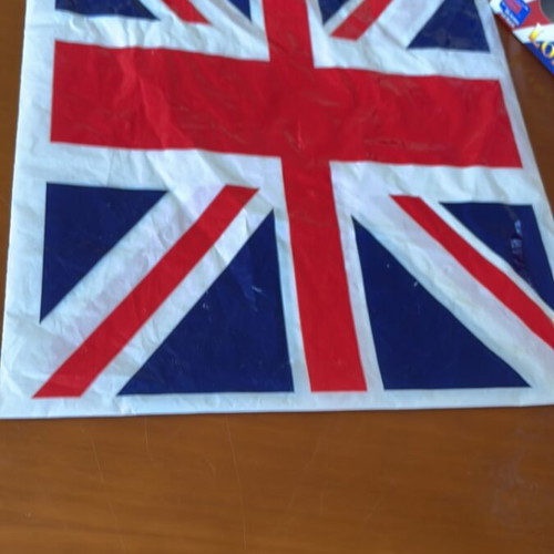 Plastic bag with English flag and small empty London bus box like new