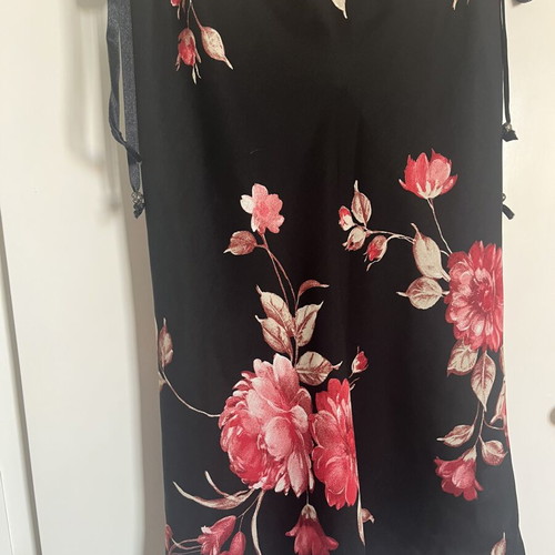 Black floral skirt with transparency medium, used