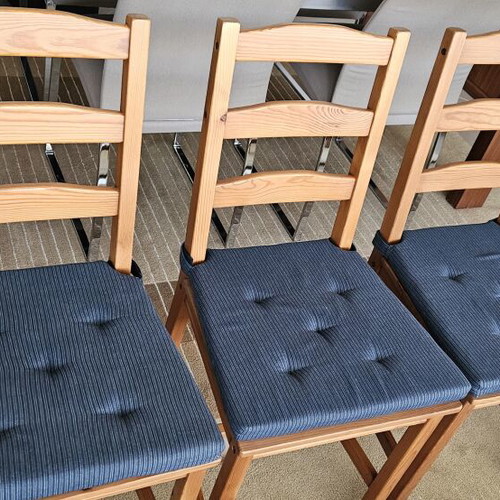 Ikea wooden chairs like new with dark blue cushions, set of four