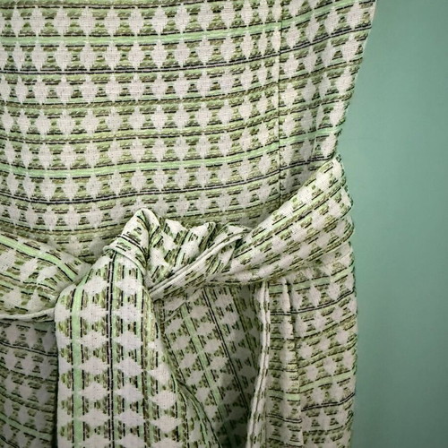 BO2 sleeveless A-line dress with green geometric brocade pattern